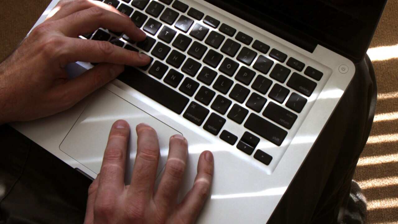 A man using a laptop