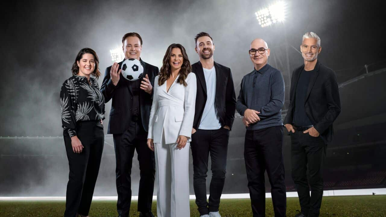 Members of the SBS commentary team for the FIFA World Cup 2022 assemble for a group photo. 