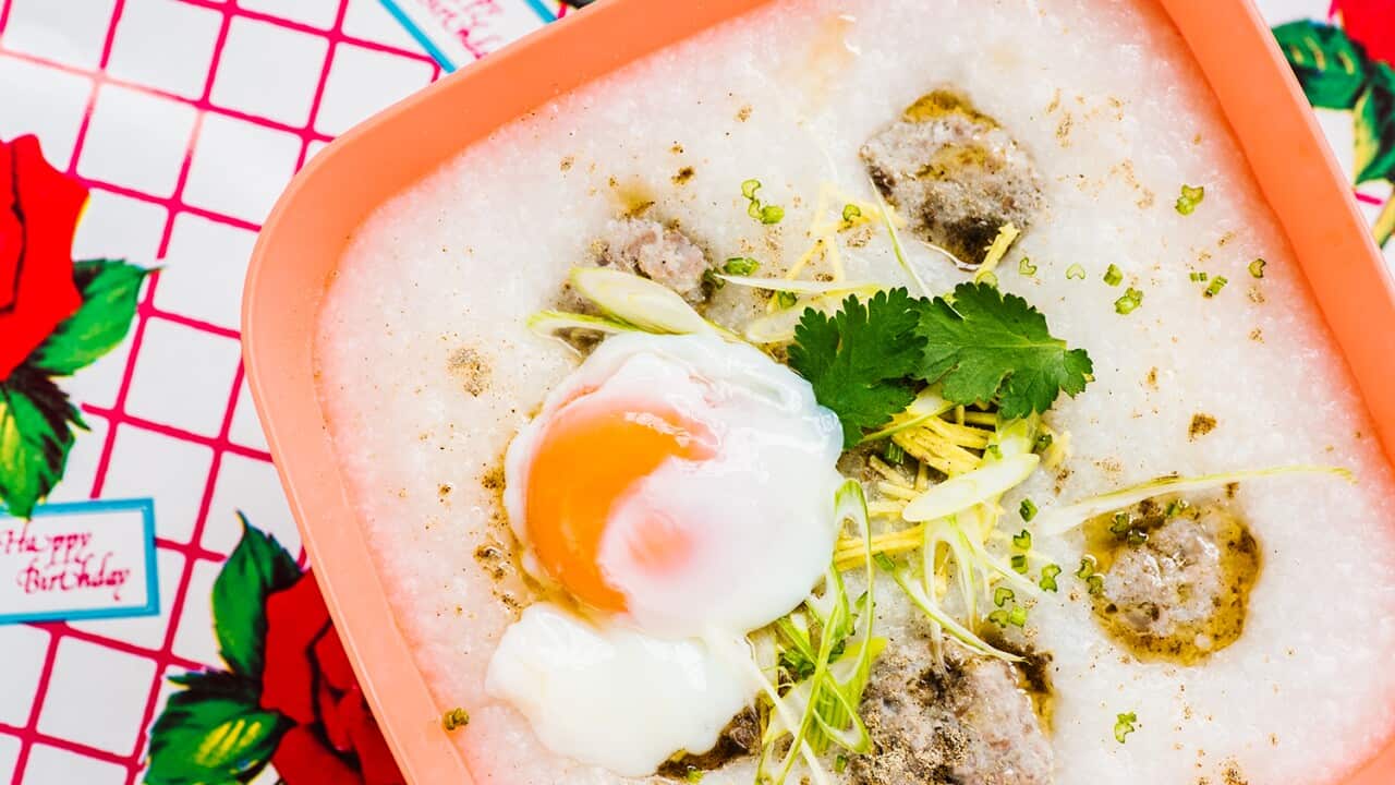 Rice porridge with pork meatballs and soft-boiled egg (jok)
