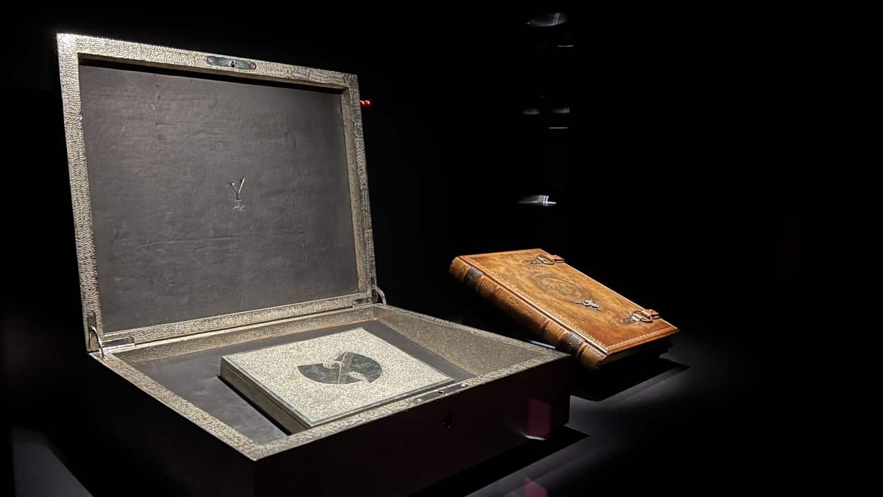 Wu-Tang Clan's Once Upon a Time in Shaolin album and lyrics book displayed in a museum.