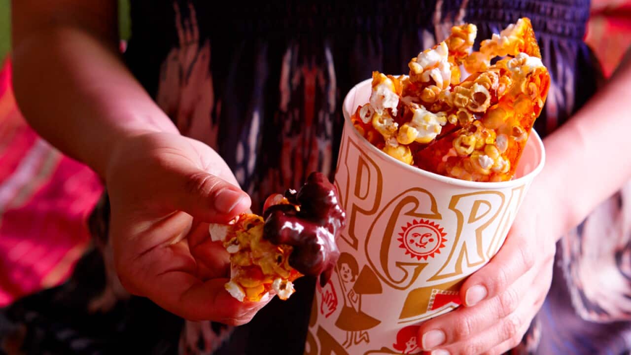 Salted caramel popcorn with dark chocolate sauce