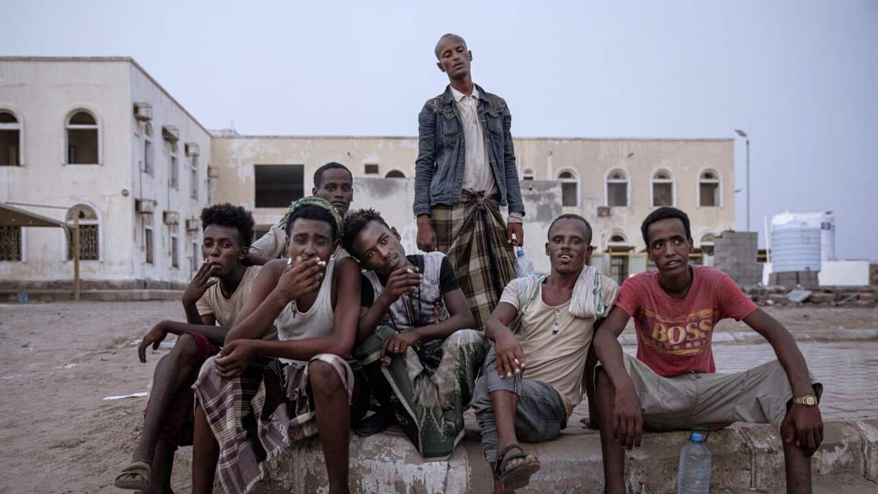 Ethiopian migrants take shelter in a soccer stadium destroyed by war, in Aden, Yemen, 21 July, 2019.