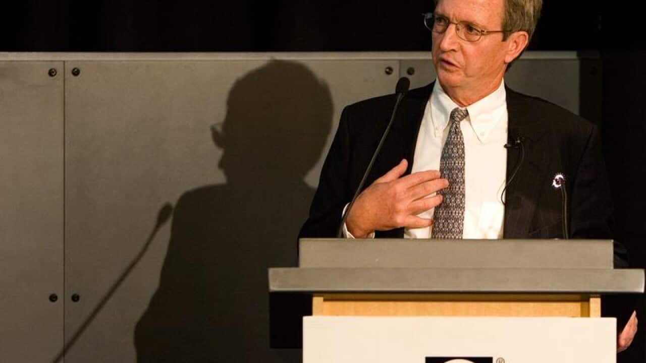 Jamies Hardie Industries CEO Louis Gries at a lecturn