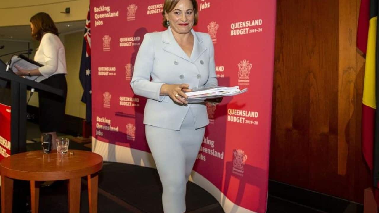 Queensland Treasurer Jackie Trad leaves a budget briefing.