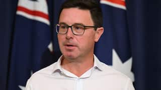 A man speaking at a press conference.