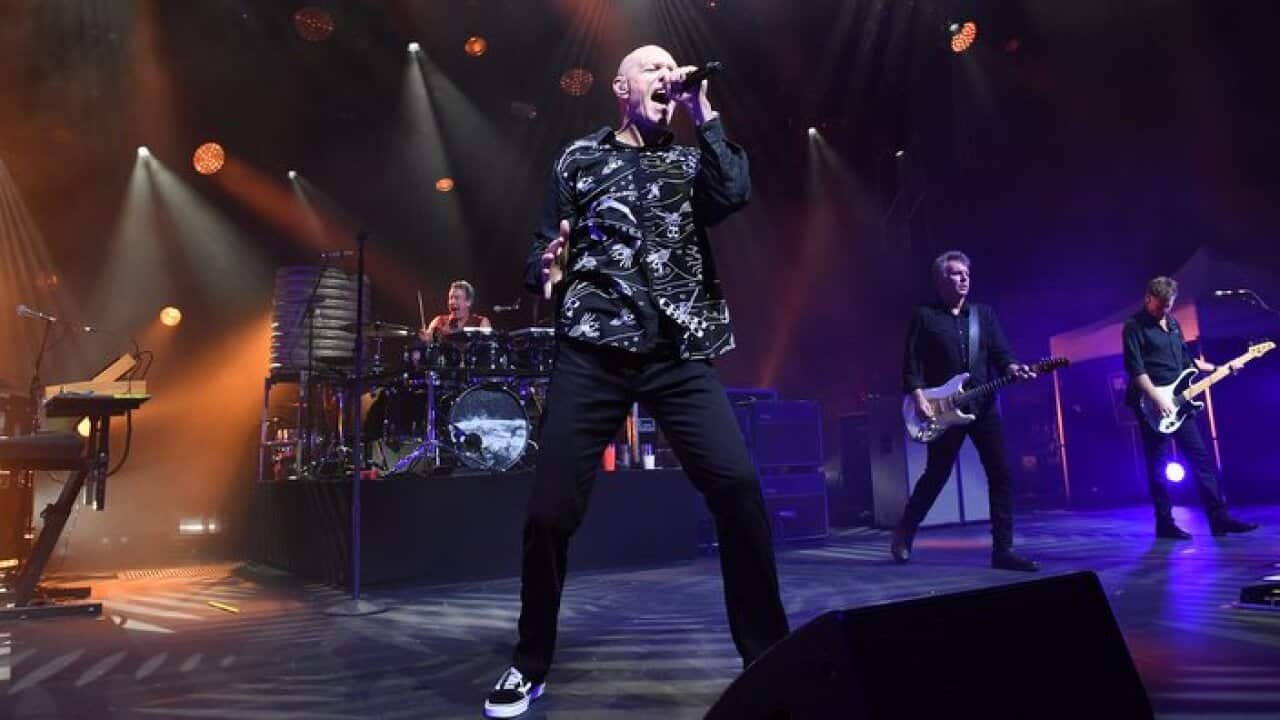 Singer Peter Garrett is seen during the Midnight Oil concert at the Riverstage in Brisbane, Tuesday, October 17, 2017. The band are currently performing the Australian leg of their world tour. (AAP Image/Dave Hunt) NO ARCHIVING