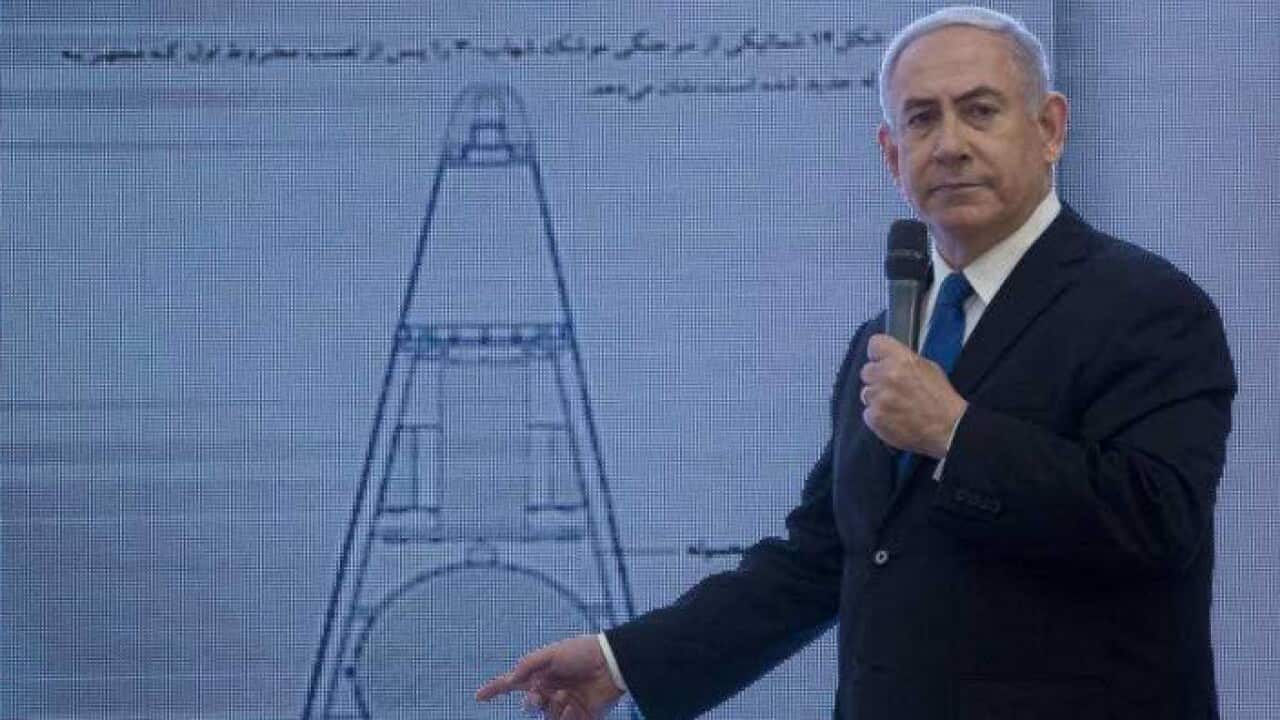Israeli Prime Minister Benjamin Netanyahu presents material on Iranian nuclear weapons development