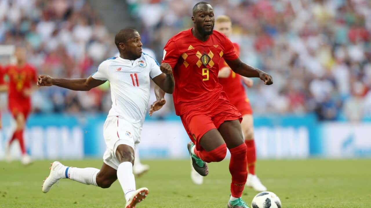 Romelu Lukaku of Belgium is challenged by Armando Cooper of Panama