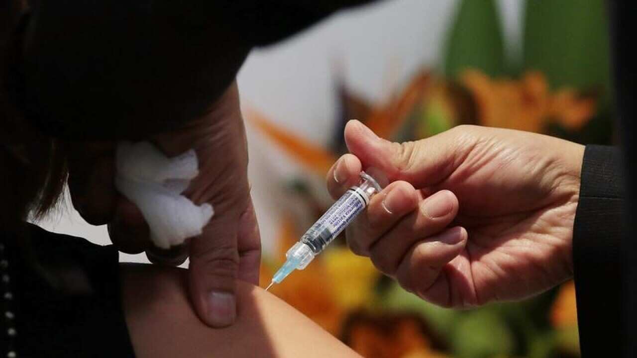 A member of the public gets a flu shot at Burwood, Vic (file image)