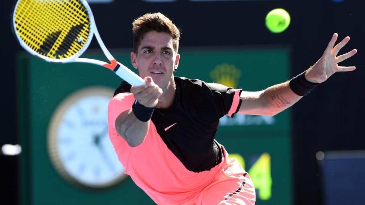 Thanasi Kokkinakis of Australia in action against Daniil Medvedev.