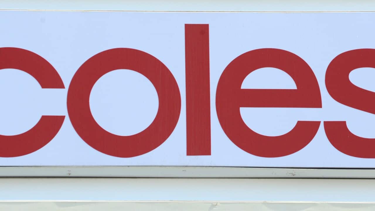 A sign outside supermarket Coles