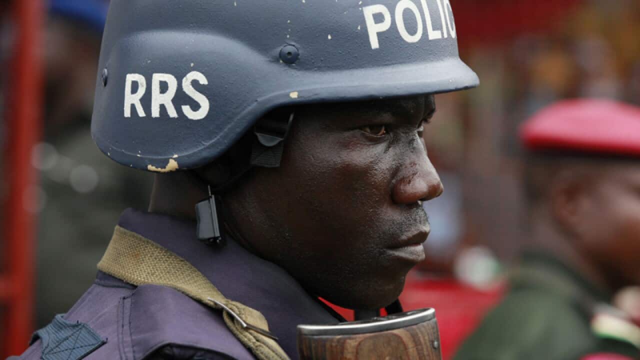 A police officer stands guard in Lagos, Nigeria