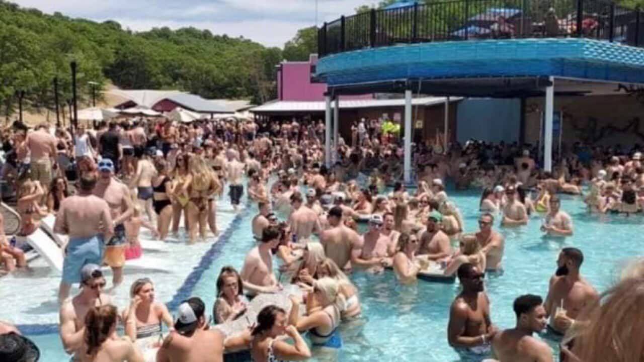A pool party in Missouri has drawn criticism as the US's death toll nears 100,000.