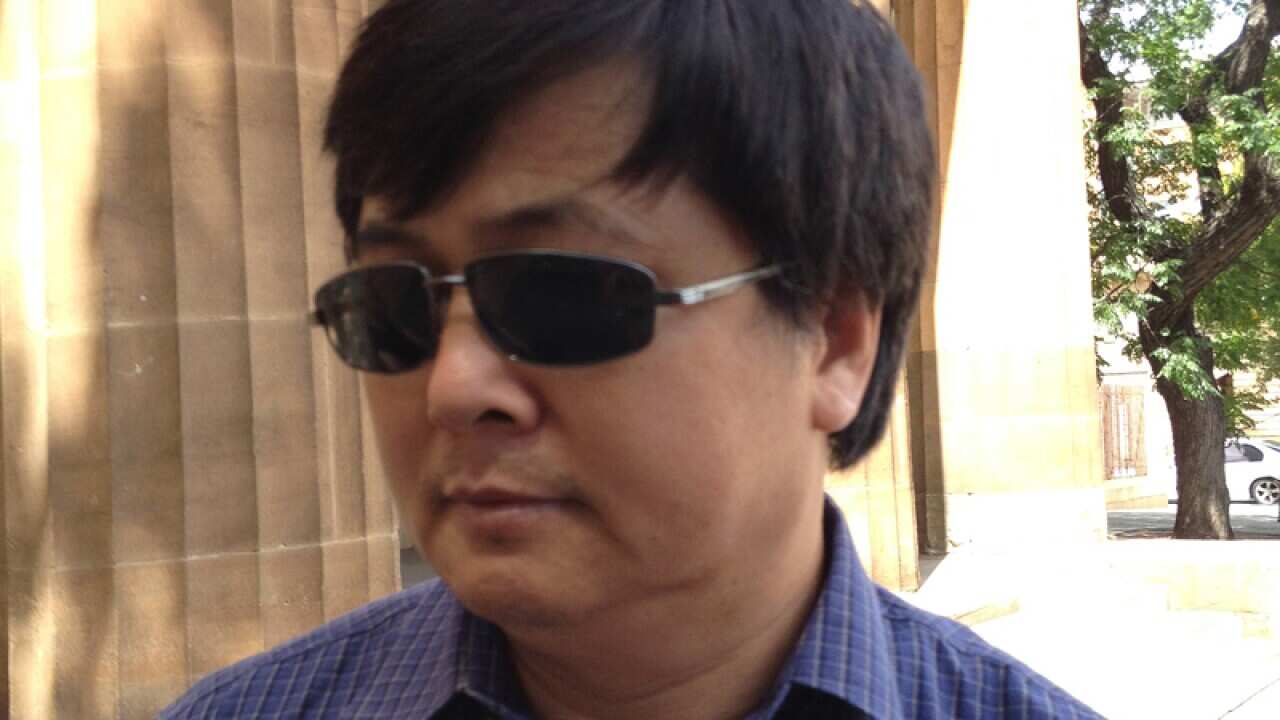 Cheng Jiang Cao leaves Adelaide Magistrates Court