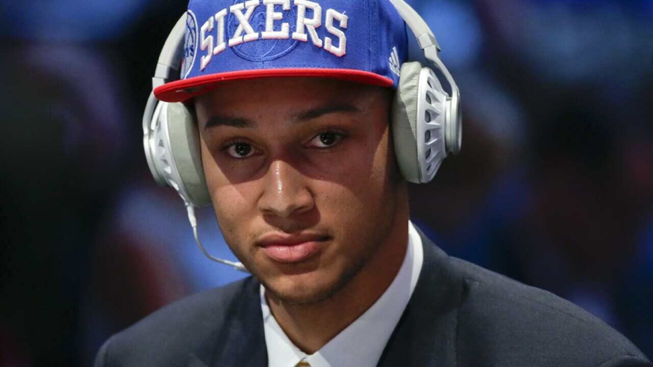 Ben Simmons answers questions during an interview