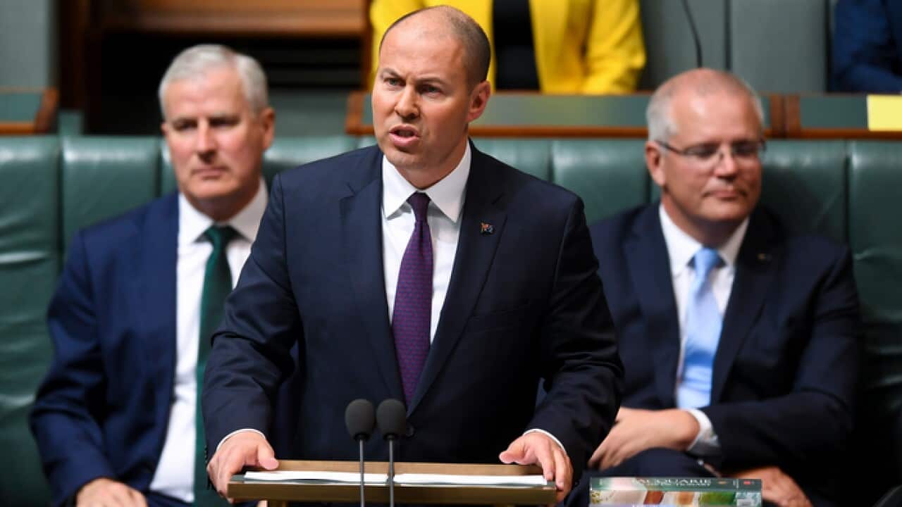 Josh Frydenberg and Scott Morrison in Parliament