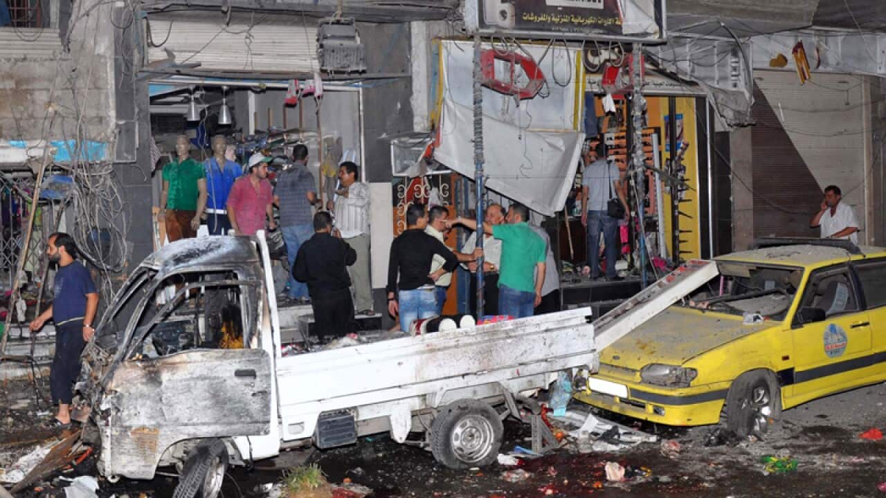 Bomb kills 18 in Damascus suburb: state TV