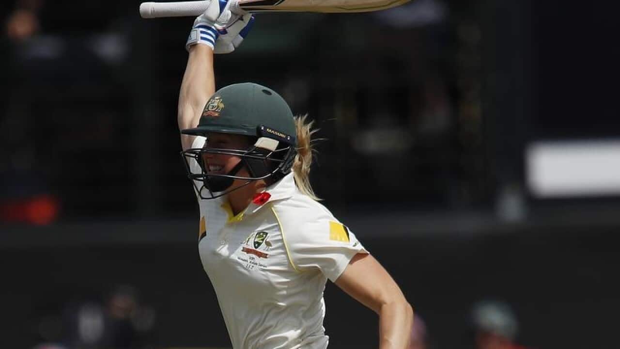 Australia's Ellyse Perry jumps in the air
