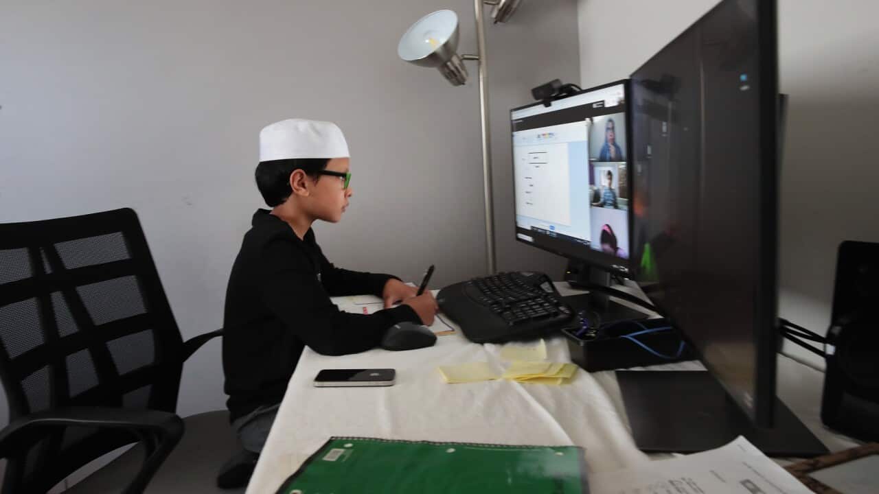 Nine-year-old Uthman Haqqani from Illinois takes part in a remote learning class
