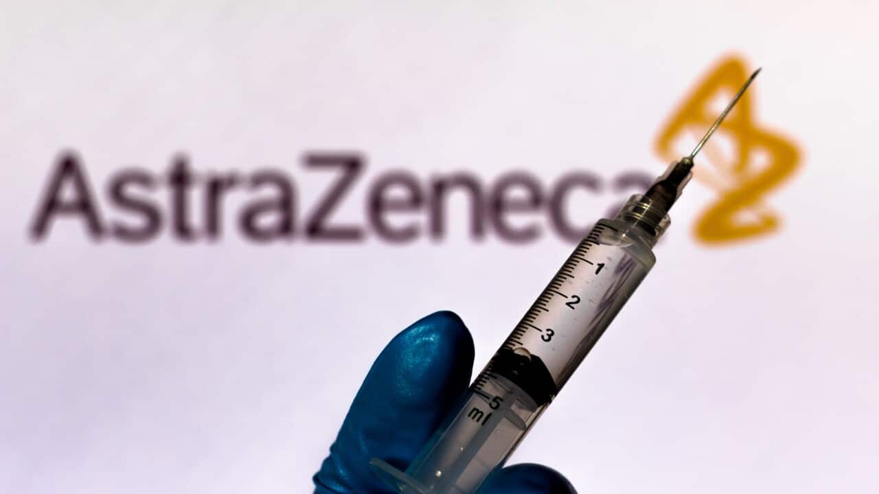In this photo illustration the medical syringe is seen with AstraZeneca company logo displayed on a screen in the background (Photo by Rafael Henrique / SOPA Images/Sipa USA)