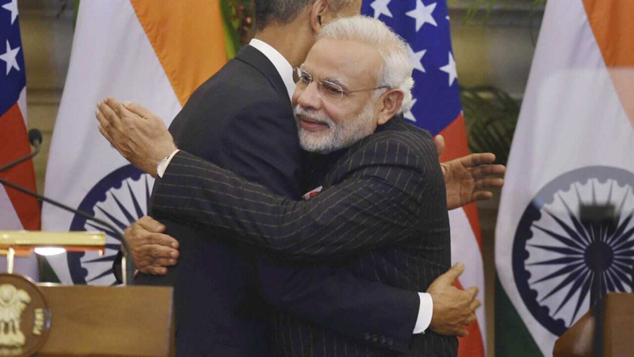 U.S. President Barack Obama, left and Indian PM Narendra Modi