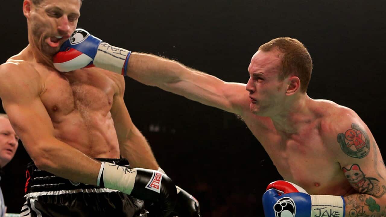 English boxers Carl Froch (L) and George Groves