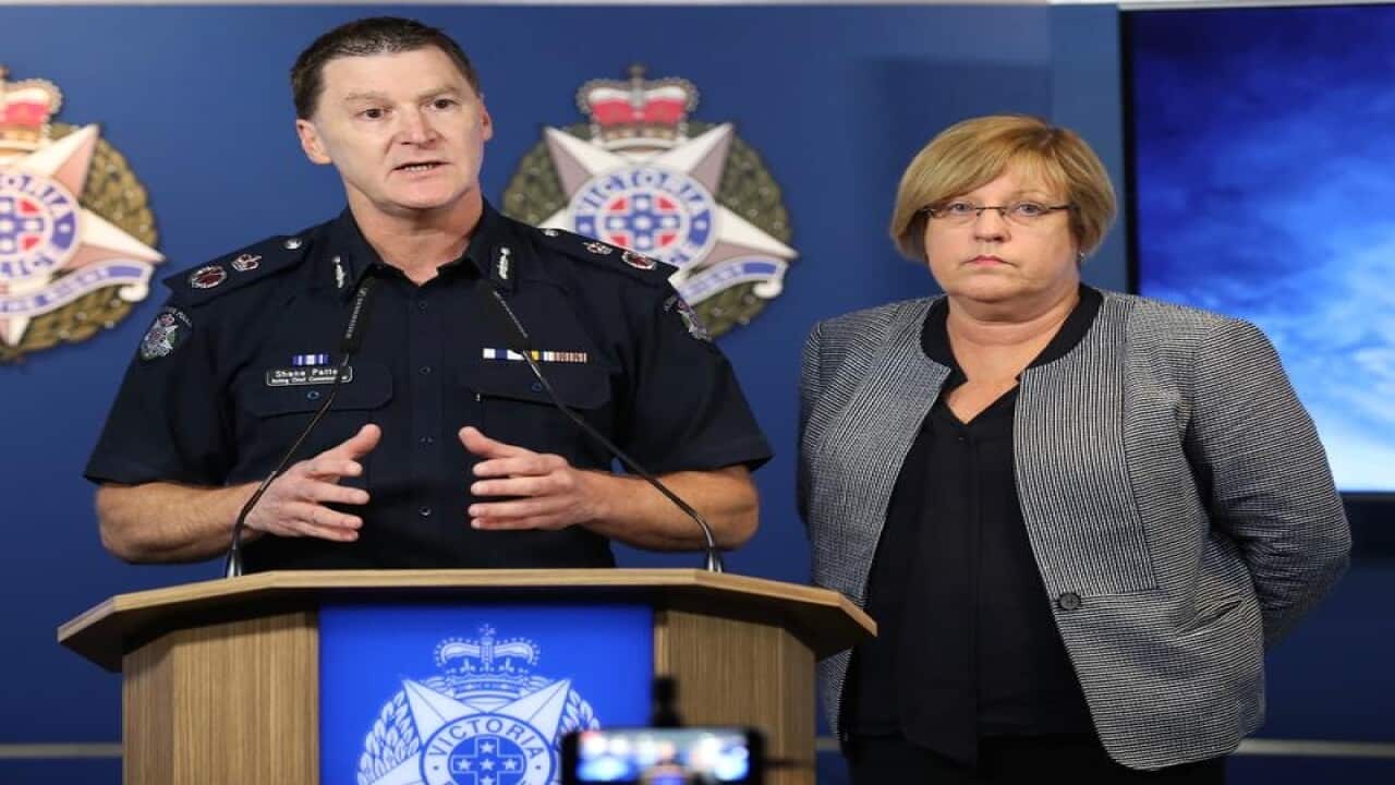 Minister Lisa Neville (R) and acting Chief Commissioner Shane Patton.