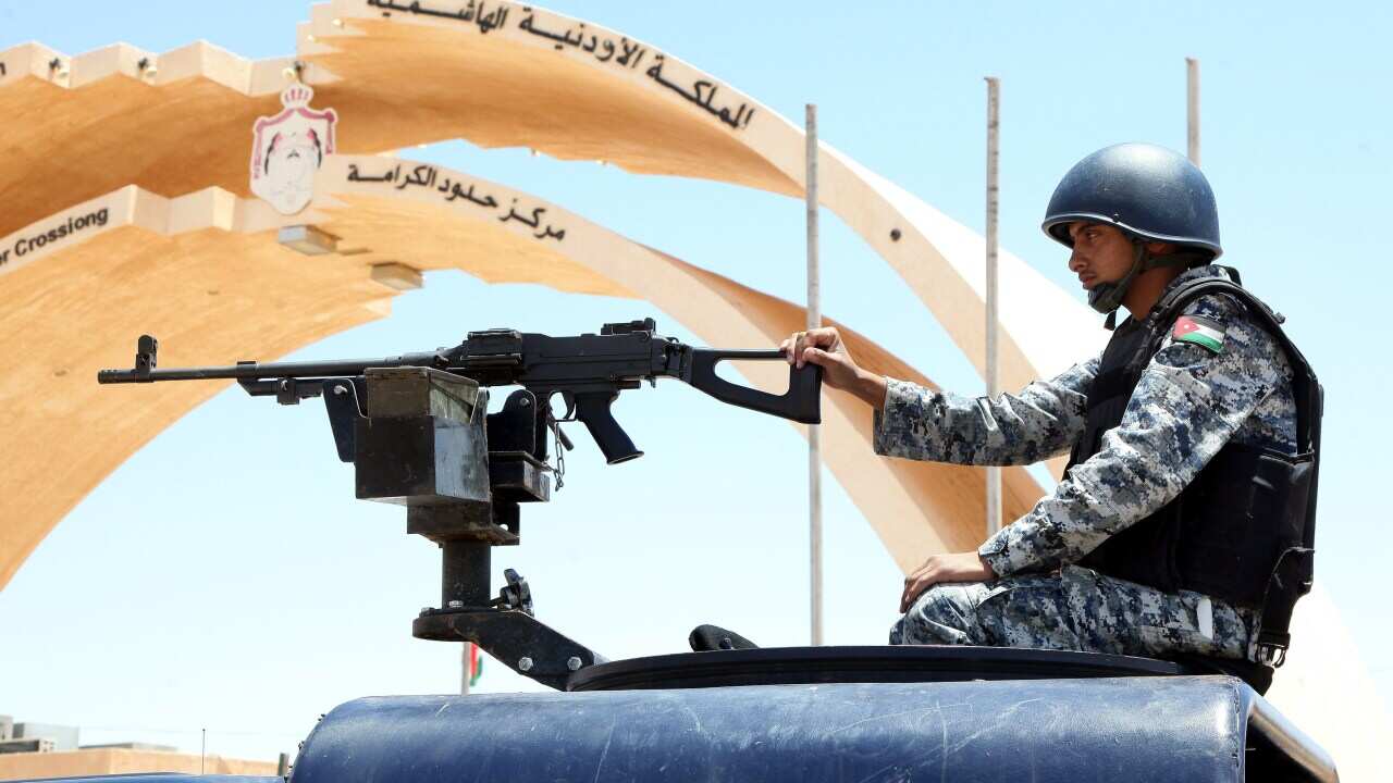 A Jordanian soldier on a military vehicle secures the area near the Al-Karameh border point with Iraq (Getty Images).