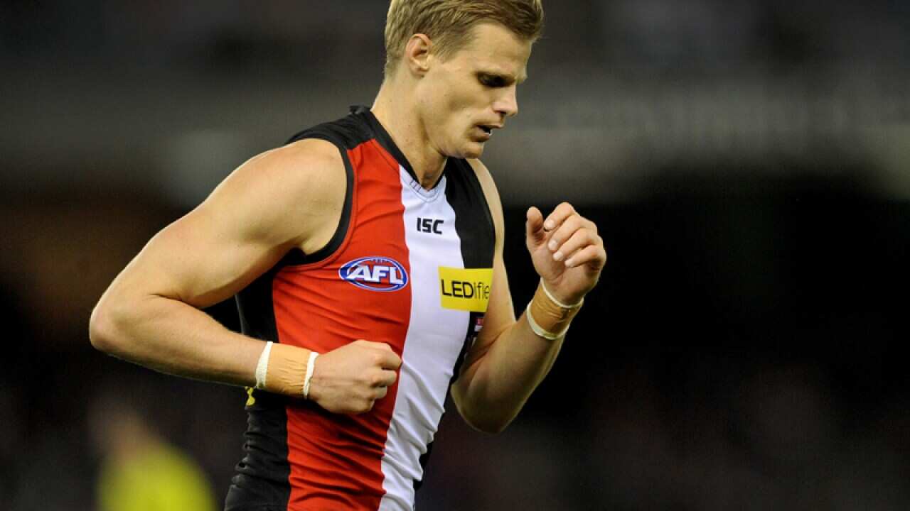 Nick Riewoldt of St Kilda runs off the ground