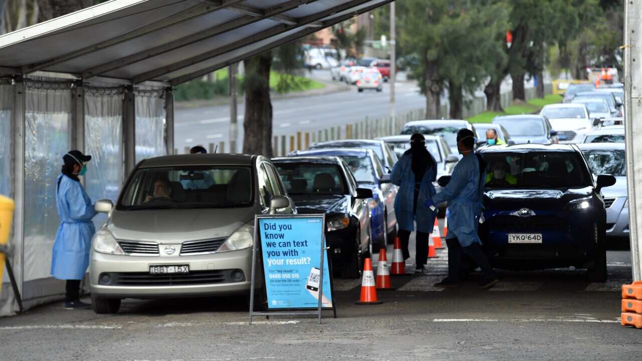 Members of the public at a pop up COVID-19 testing clinic at Roselands shopping centre in Sydney.