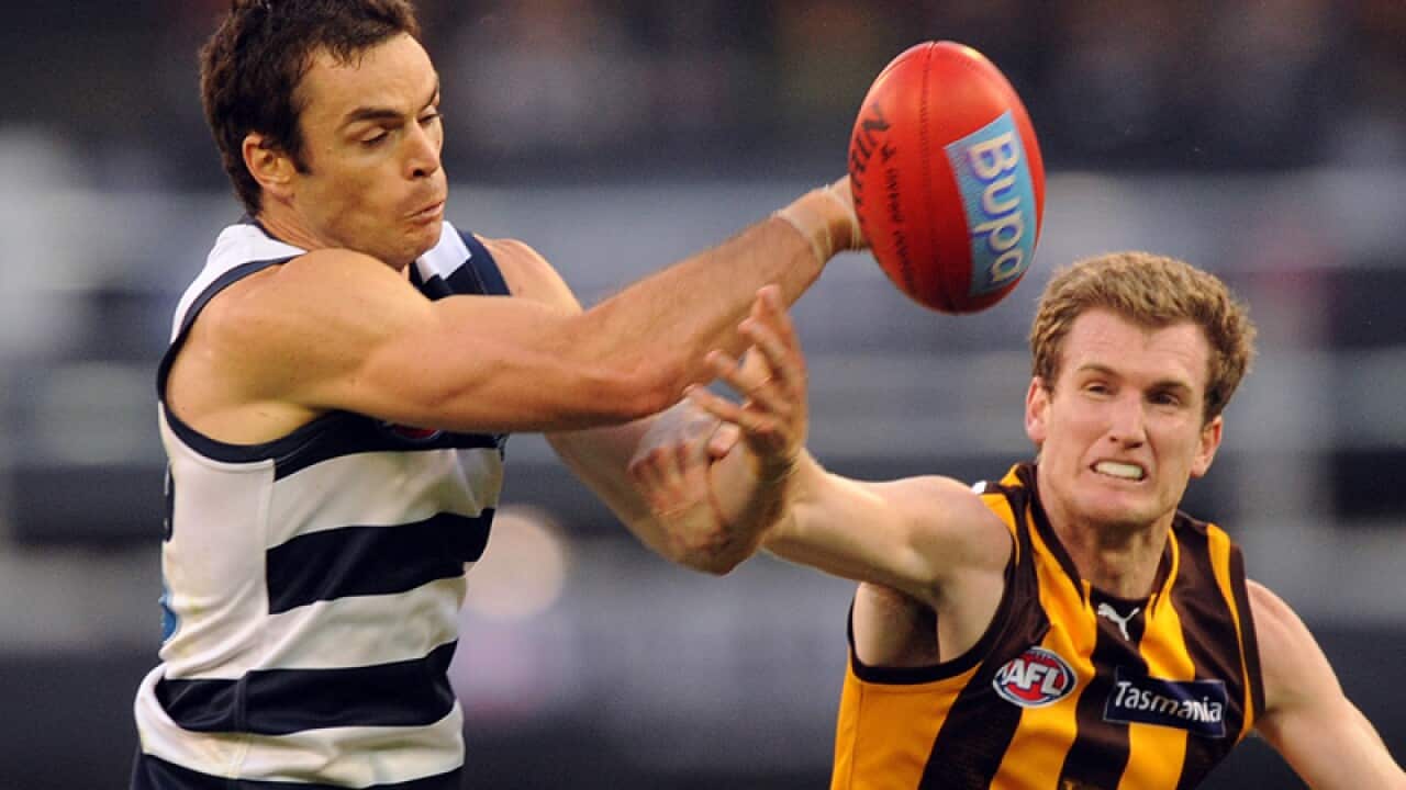 West Coast recruit Xavier Ellis (R) plays for his old club Hawthorn.