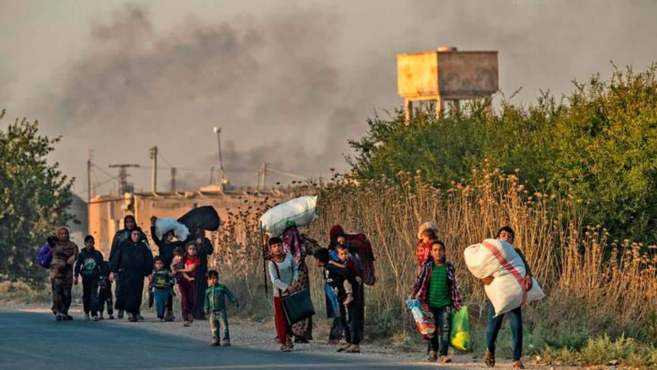 Ras al-Ain residents fleeing due to Turkey's attacks