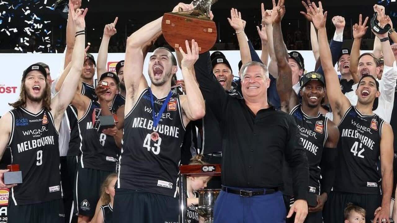 United player Chris Goulding and coach Dean Vickerman celebrate