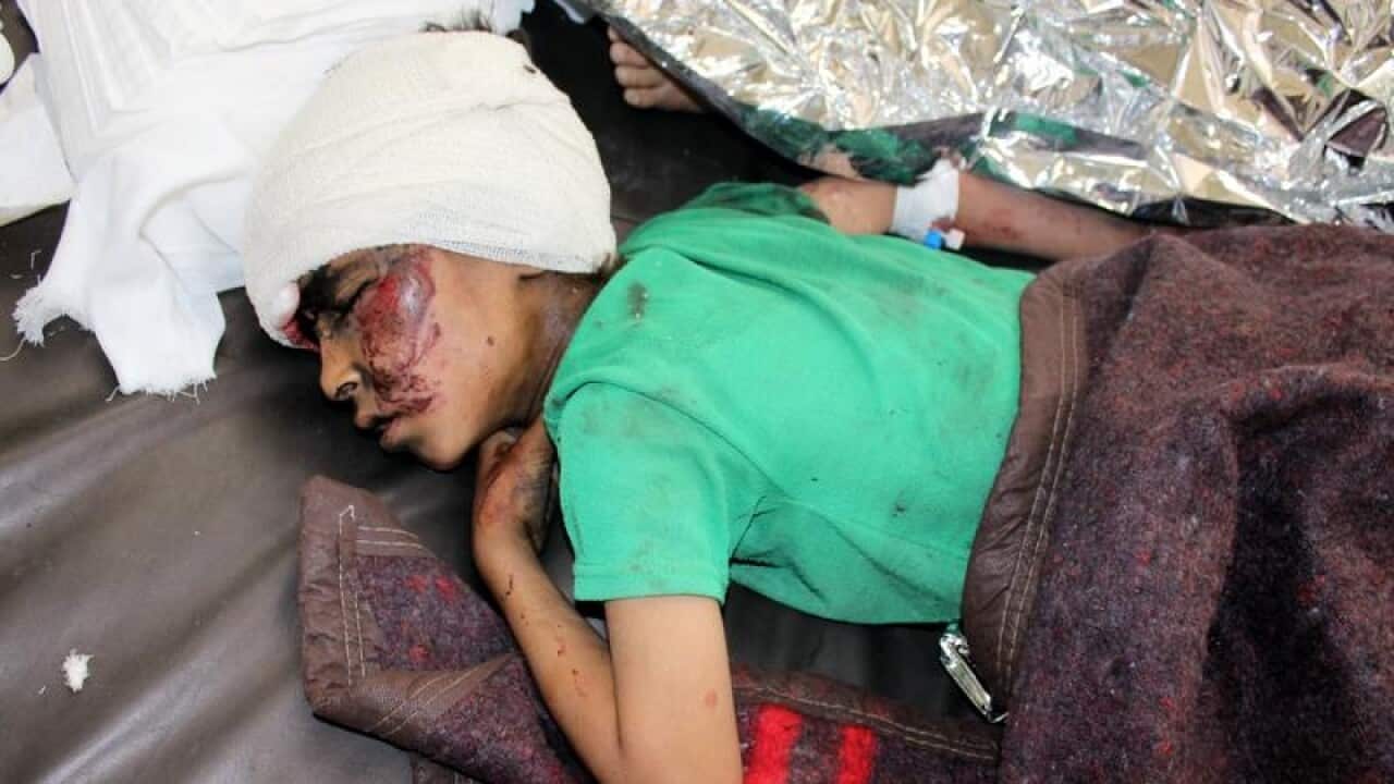 Injured child after air strike in Yemen