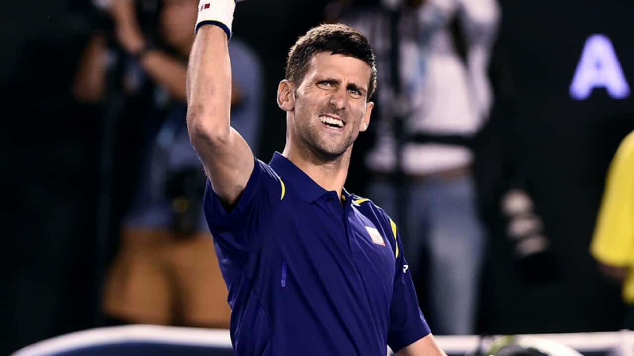 Novak Djokovic of Serbia celebrates winning against Kei Nishikori