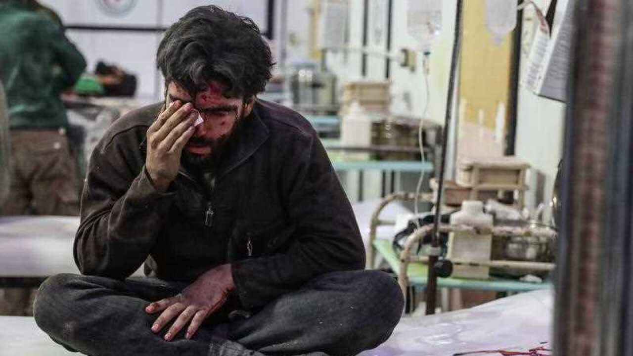 An injured man gets treatment at a hospital in rebel-held Eastern Ghouta, Syria