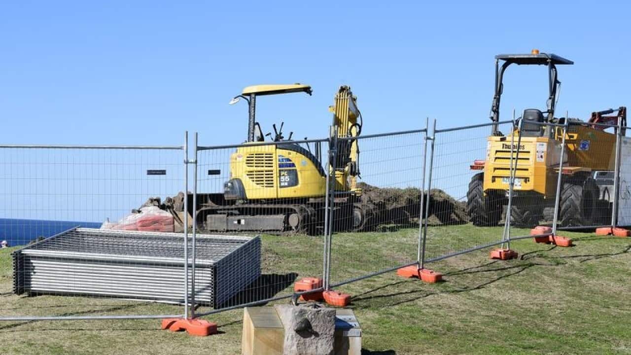 Machinery at the site of a new cement path at Marks Park