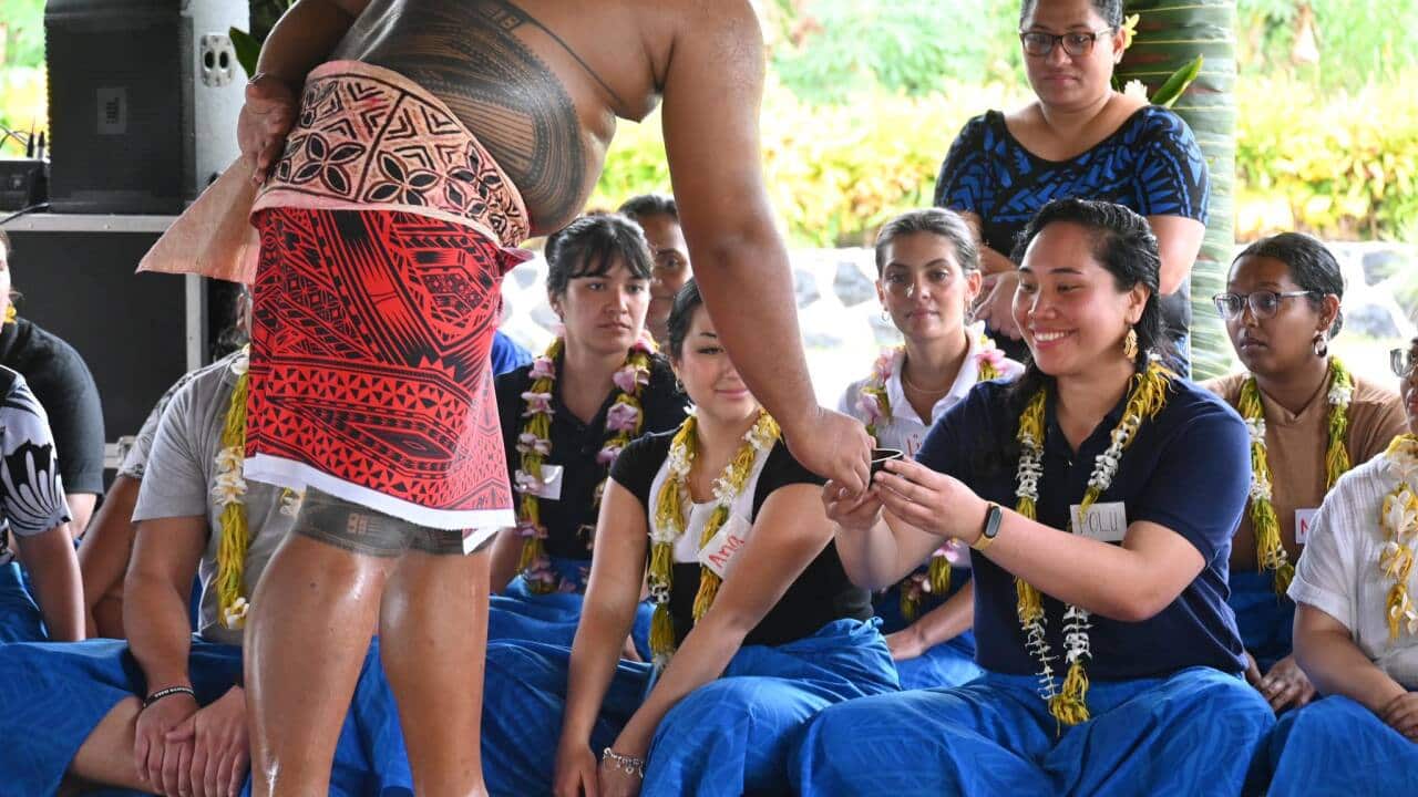 Annette Faleupolu Ah Young receives áva for welcoming new group of US Peace Corpse volunteers.jpg