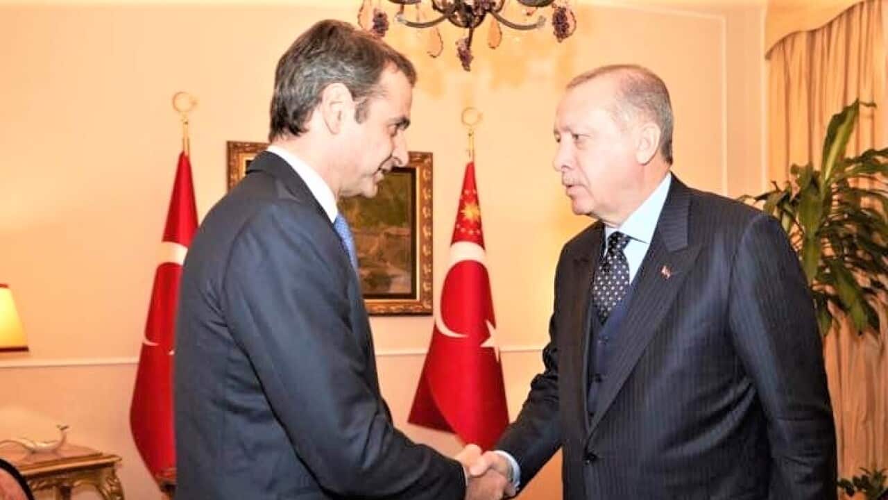 L: Greek PM Kyriakos Mitsotakis, Turkish President Tayip Erdogan.