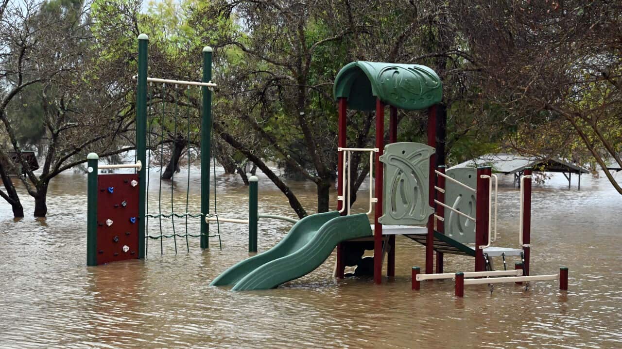 A childrens play area is seen inundated by floodwaters in Camden in South Western Sydney, Sunday, July 3, 2022. (AAP Image/Mick Tsikas) NO ARCHIVING