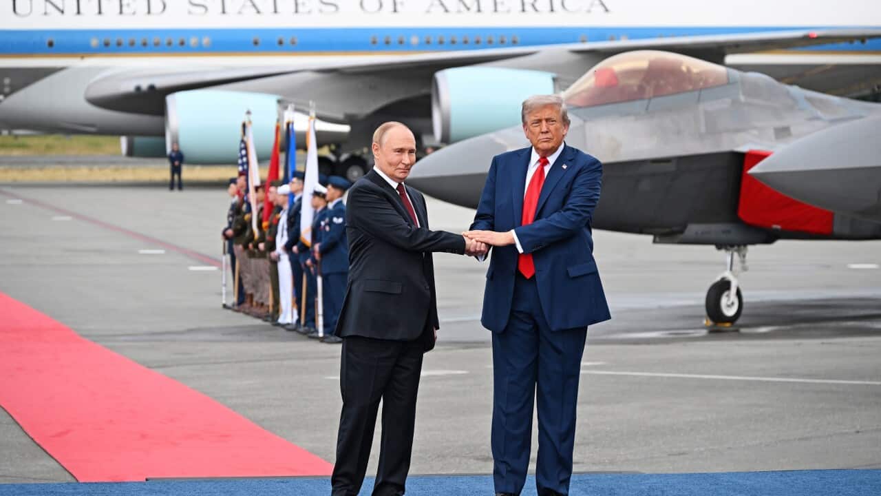 Russian President Vladimir Putin and U.S. President Donald Trump meet at Elmendorf-Richardson Air Force Base.