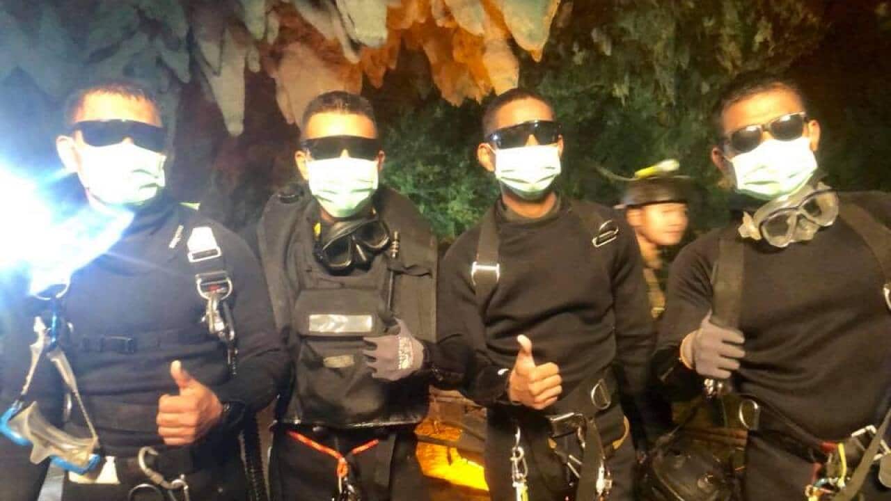 Thai Navy Seals give the thumbs up after a job well done.