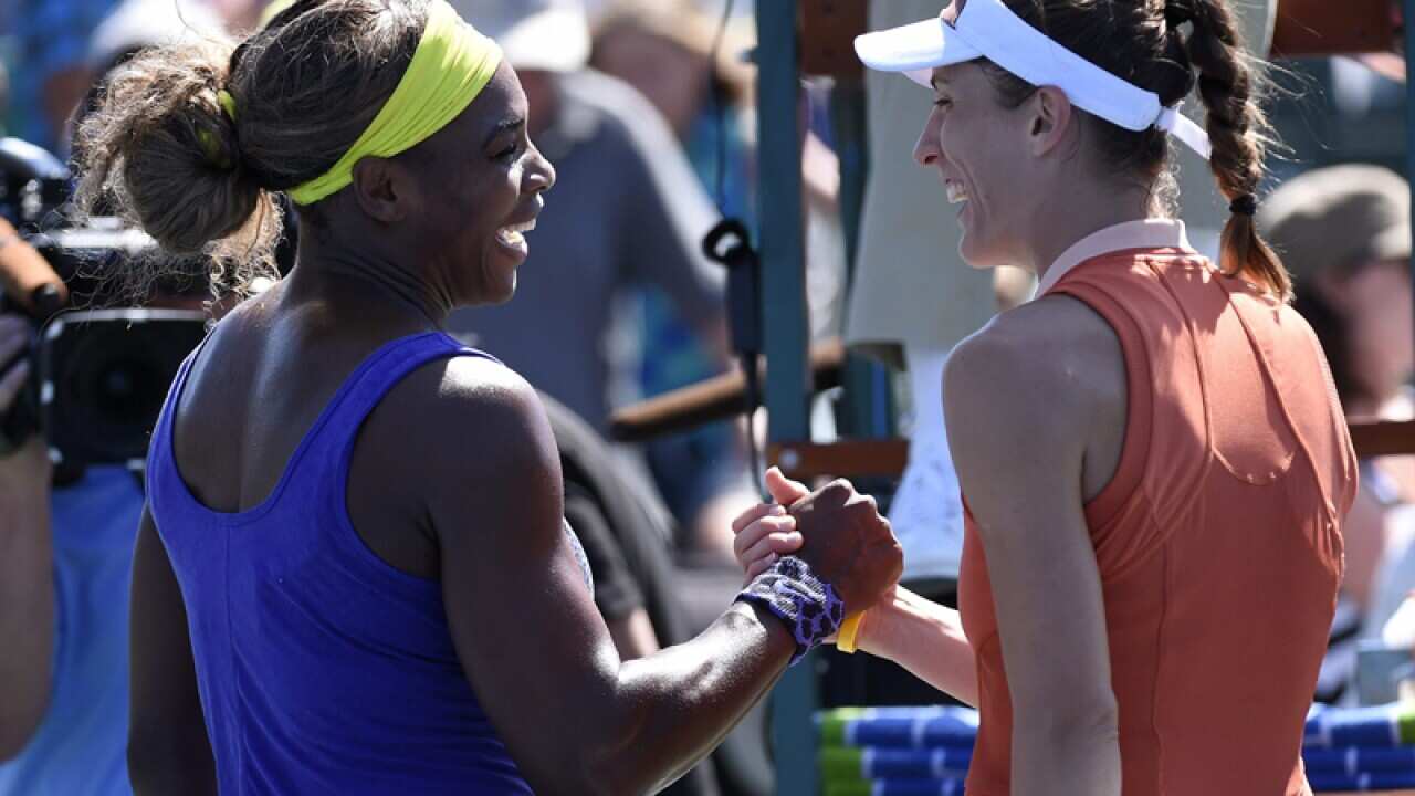 Serena Williams of the US (L)  with Andrea Petkovic of Germany (R)