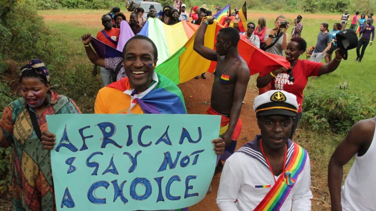 Gay and lesbian activists attend Uganda's first gay pride parade in 2012 (AAP)
