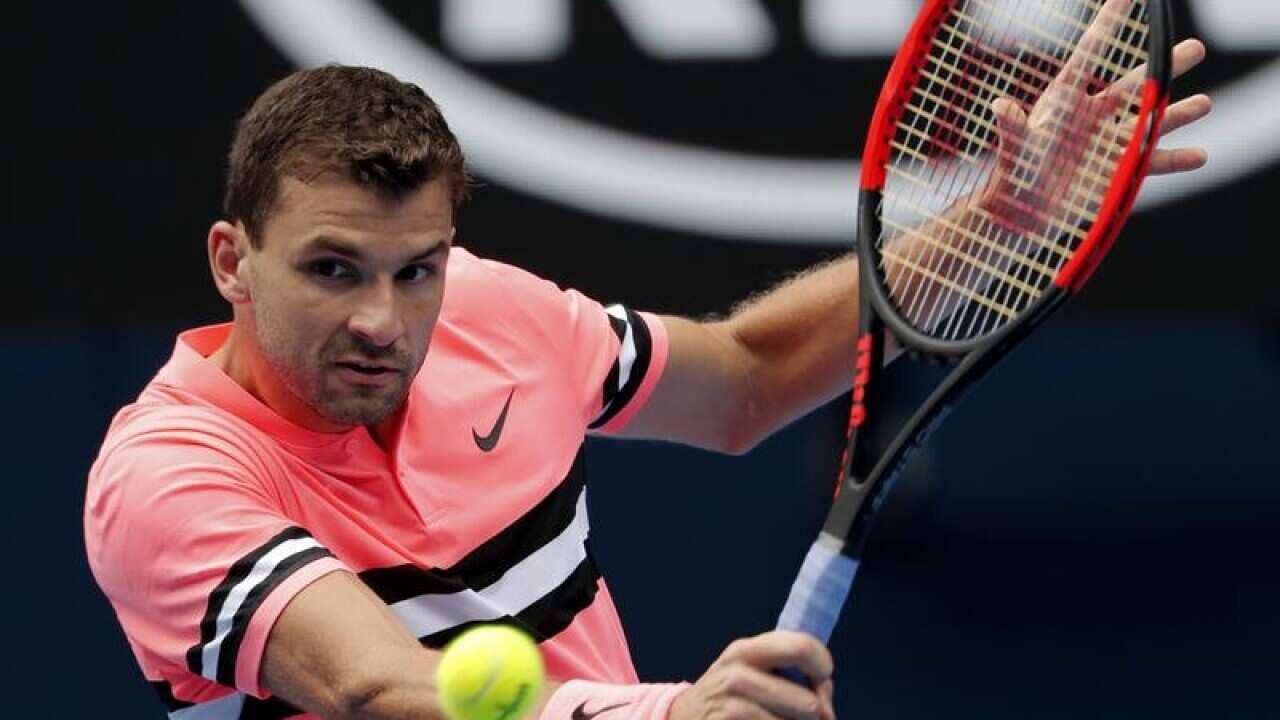 Bulgaria's Grigor Dimitrov makes a backhand return.
