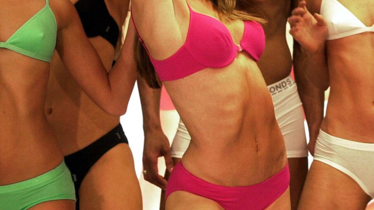 File photo of models wearing Bonds, a Pacific Brands label