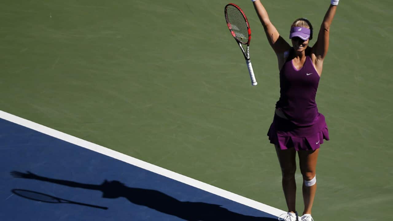 Mirjana Lucic-Baroni, of Croatia, reacts after defeating Simona Halep, of Romania, during the third round of the 2014 U.S. Open tennis tournament, Friday, Aug. 29, 2014, in New York. (AP Photo/Elise Amendola)