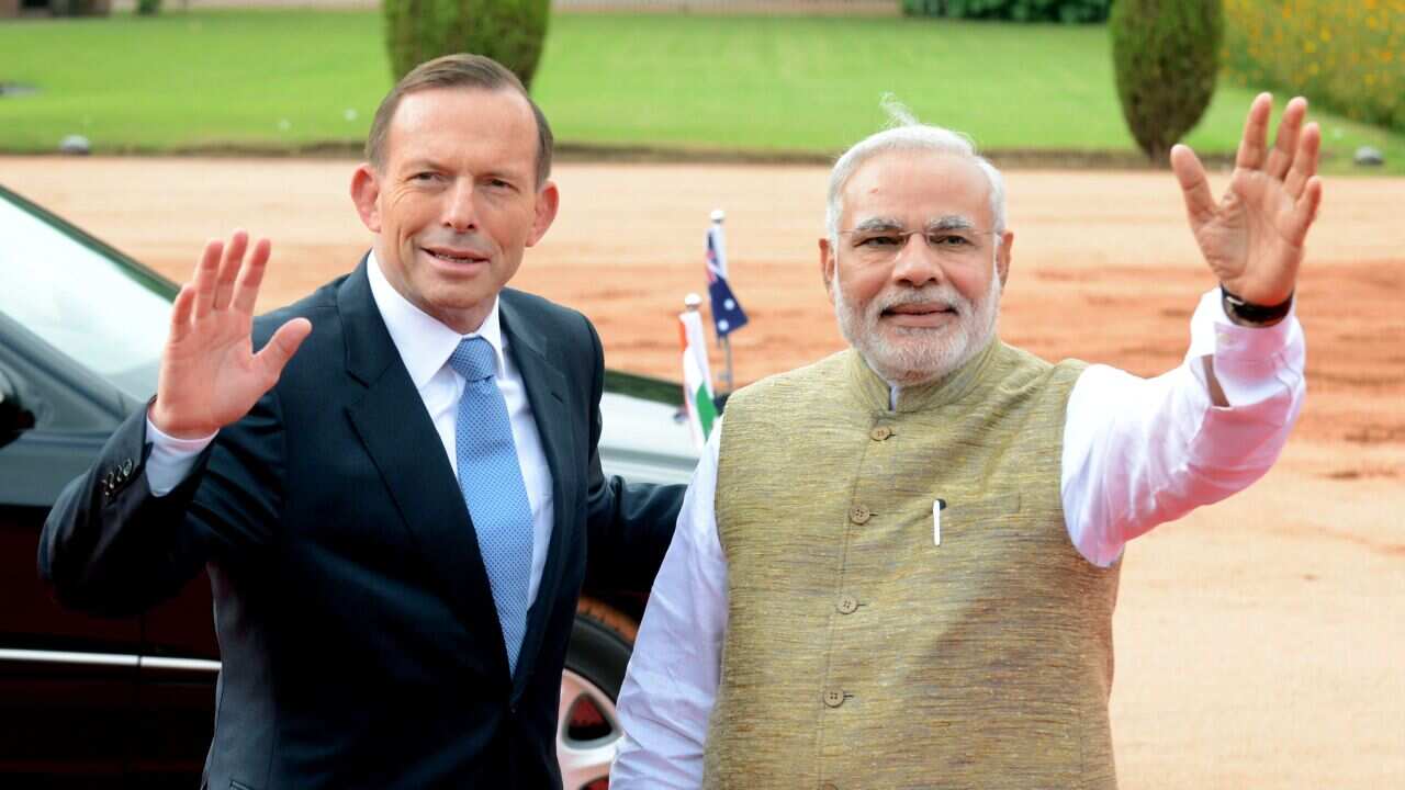 Australian Prime Minister Tony Abbott (L) and Indian Prime Minister Narendra Modi (AAP)