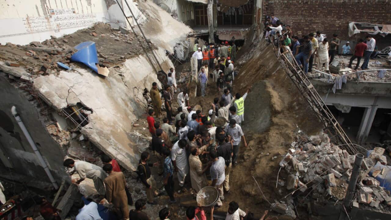 Aftermath of Pakistan Mosque collapse.