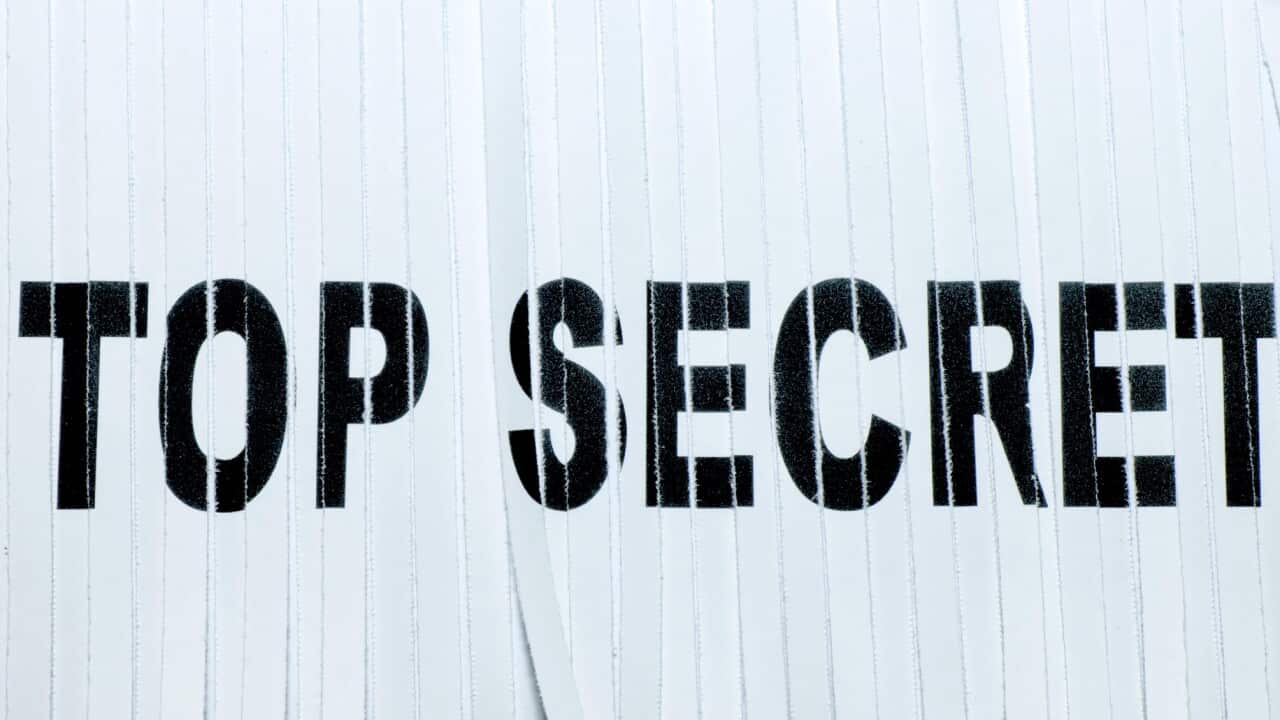 Top secret papers chased through the shredder, Berlin, Germany